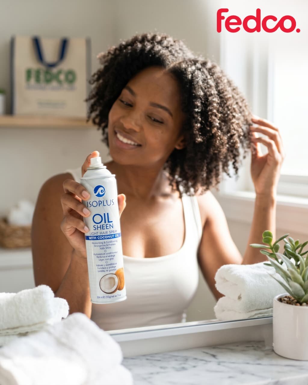 Isoplus Oil Sheen Light Hair Spray con aceite de coco